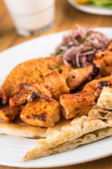 Traditional Turkish grilled Chicken shish kebab with vegetables grilled on skewers