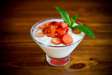 sweet homemade yogurt with red ripe fresh strawberries