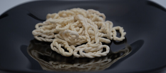 Lorighittas, an ancient pasta of the Sardinian tradition. the term lorighittas means rings or...