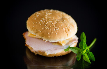 morning sandwich with bacon, cheese and herbs