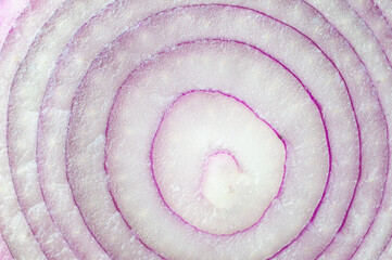Full frame red onion in the cut
