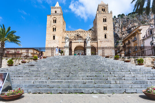 CEFALU, ITALY - JUNE 25, 2011: gate in Duomo di Cefalu in Sicily. Cathedral - Basilica of Cefalu was erected in 1131 in the Norman architectural style