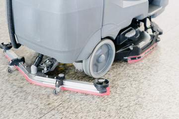 cleaning floor with machine