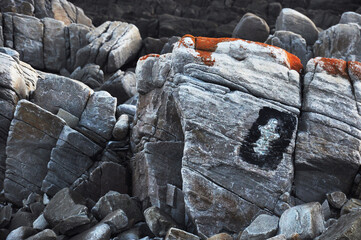 sharp rocks pointing out the trail