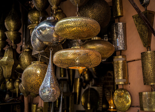 Traditional Moroccan lamps hanging in the door in the Medina bazaar of Marrakesh.Morocco.