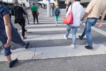 pedestrians on crosswalk on street