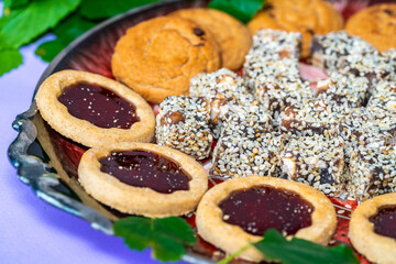 cookies with jam and Turkish delight on a beautiful dish