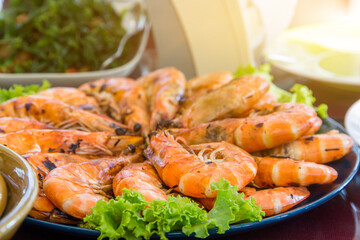 Grilled shrimps and vegetable on plate,Grilled shrimps on dish wooden table