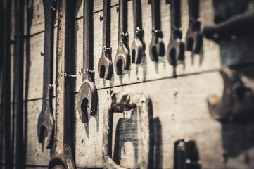 Various tool sets for car and motorcycle maintenance On a wooden panel background Self repair concept.