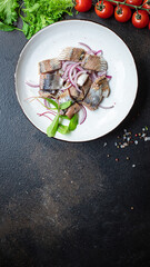 herring salad piece slice onion snack seafood fish serving size top view for text copy space keto or paleo diet raw pescetarian food background rustic