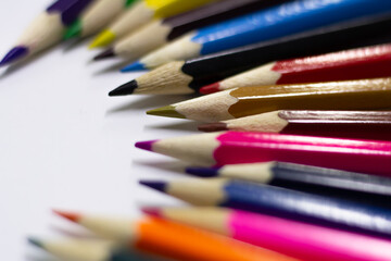Fototapeta premium colored pencils on a white background