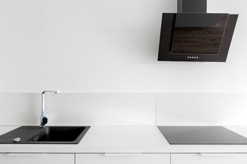 Black details in white kitchen