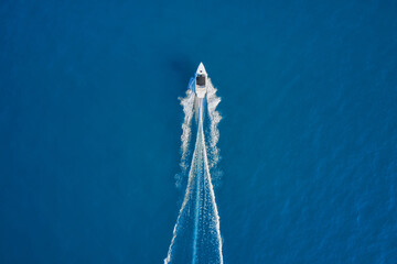 Motor boat in the sea. Aerial view luxury motor boat. Drone view of a boat sailing. Travel - image....