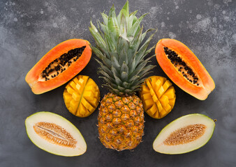 Fresh tropical fruit in a tray, top view