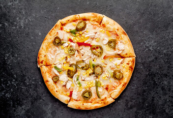 Mexican pizza with ingredients on stone background 
with copy space for your text