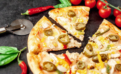 Mexican pizza with ingredients on stone background