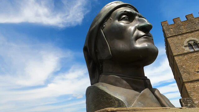 bust of Dante Alighieri placed in the square in front of the castle of Poppi