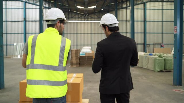 The engineer shake hands with the inspector to show their cooperation in the inspection.
