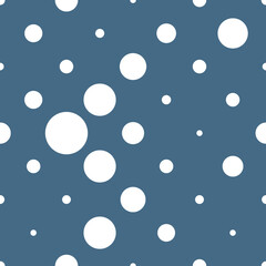 White polka dots different sizes in a chaotic arrangement without any logic. Seamless pattern