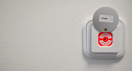 Emergency button in a building, part of building services engineering and building security,...