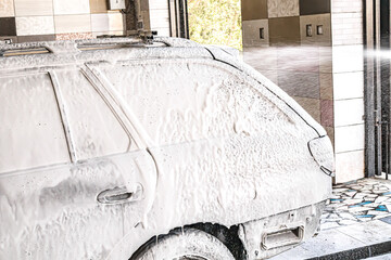 Manual car wash with car shampoo
