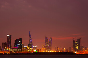 Fototapeta na wymiar MANAMA , BAHRAIN - DECEMBER 08: Bahrain skyline with iconic towers during dusk on December 08, 2019, Bahrain
