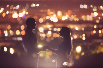 Romantic Lovers couple against background night city, sky star. Concept romance date Valentine Day,...