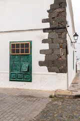 Window view and street corner in Villa de Teguise, Lanzarote island, Canary Islands