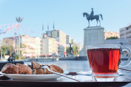 Traditional Turkish tea and delicious Turkish bagel with Ulus square background - Ulus, Ankara - Turkey