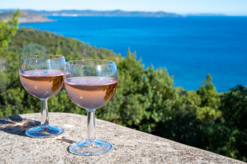 Picnic with of local rose wine and blue Mediterranean sea on background, near Saint-Tropez, Var, Provence, France
