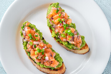 Guacamole and salmon toasts
