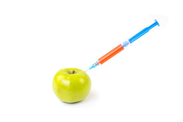 An apple with a syringe on a white background. Apple growing concept.