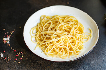 pasta spaghetti in plate macaroni semola durum wheat top view copy space for text food background rustic 