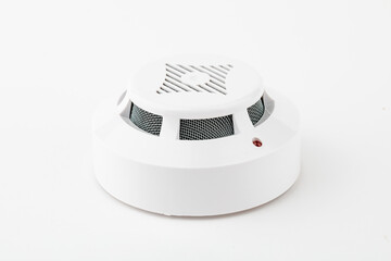 Ceiling smoke detector on a white background