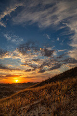 Beautiful morning desert landscape at sunrise with dunes.