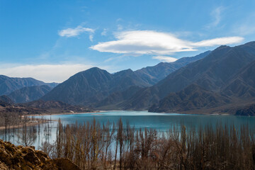 Majestic Potrerillos Mountains in front of the lake.