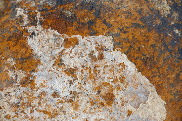 Abstract texture of orange coloured stone, background wallpaper