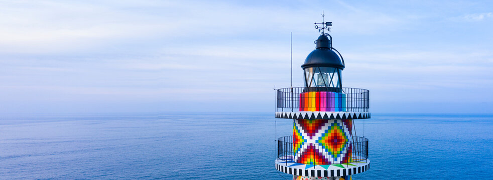 Cabo de Ajo Lighthouse painted by the painter Okuda San Miguel, specialized in Urban Art. Ajo, Bareyo Municipality, Cantabria, Cantabrian Sea, Spain, Europe