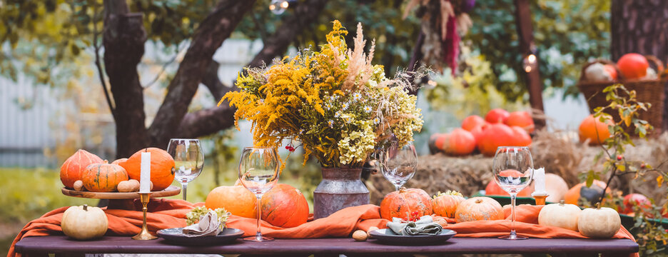 Fall Themed Holiday Table Setting Arrangement For A Seasonal Party, Banner