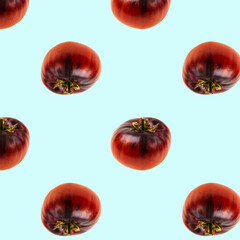 View of pattern of ripe red tomato isolated on blue background. Organic vegetables concept.