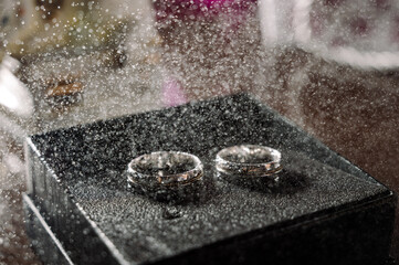 Two silver wedding rings. Close-up view of silver wedding rings in a box