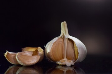 garlic on black background