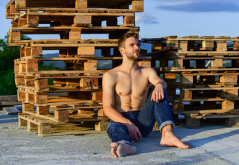 Time to relax. naked strong man. muscular strong man has bristle on face. athletic body shape....