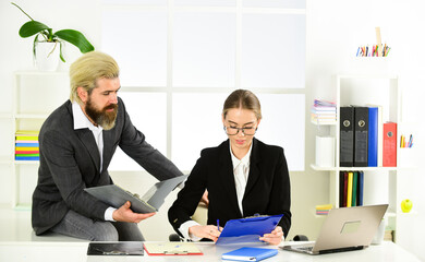 Glad to hear it. boss and supervisor manager are working. sexual harassment. male boss with his secretary. office couple discuss business. modern office life. Accountant or secretary at work