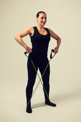 fitness woman with elastic bands doing shoulder exercises