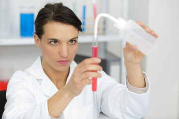 chemistry student working in laboratory
