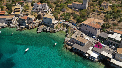 Fototapeta na wymiar Aerial drone photo of beautiful small seaside village of Limeni with emerald clear sea, Mani Peninsula, Lakonia, Peloponnese, Greece