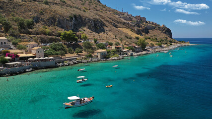 Obraz premium Aerial drone photo of beautiful small seaside village of Limeni with emerald clear sea, Mani Peninsula, Lakonia, Peloponnese, Greece
