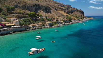Obraz premium Aerial drone photo of beautiful small seaside village of Limeni with emerald clear sea, Mani Peninsula, Lakonia, Peloponnese, Greece