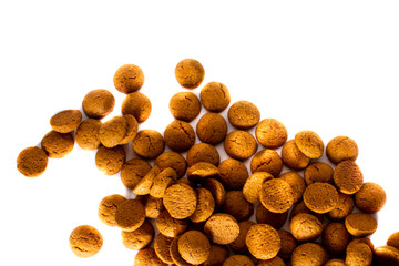 Pepernoten candy on white background